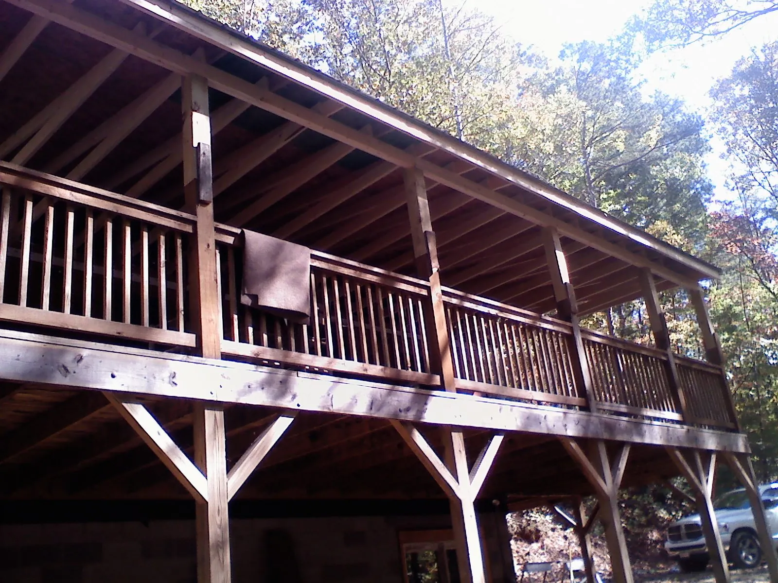 Timber framing under a new elevated porch and deck — Roof Leak Repair in Langston by Roofing Brothers